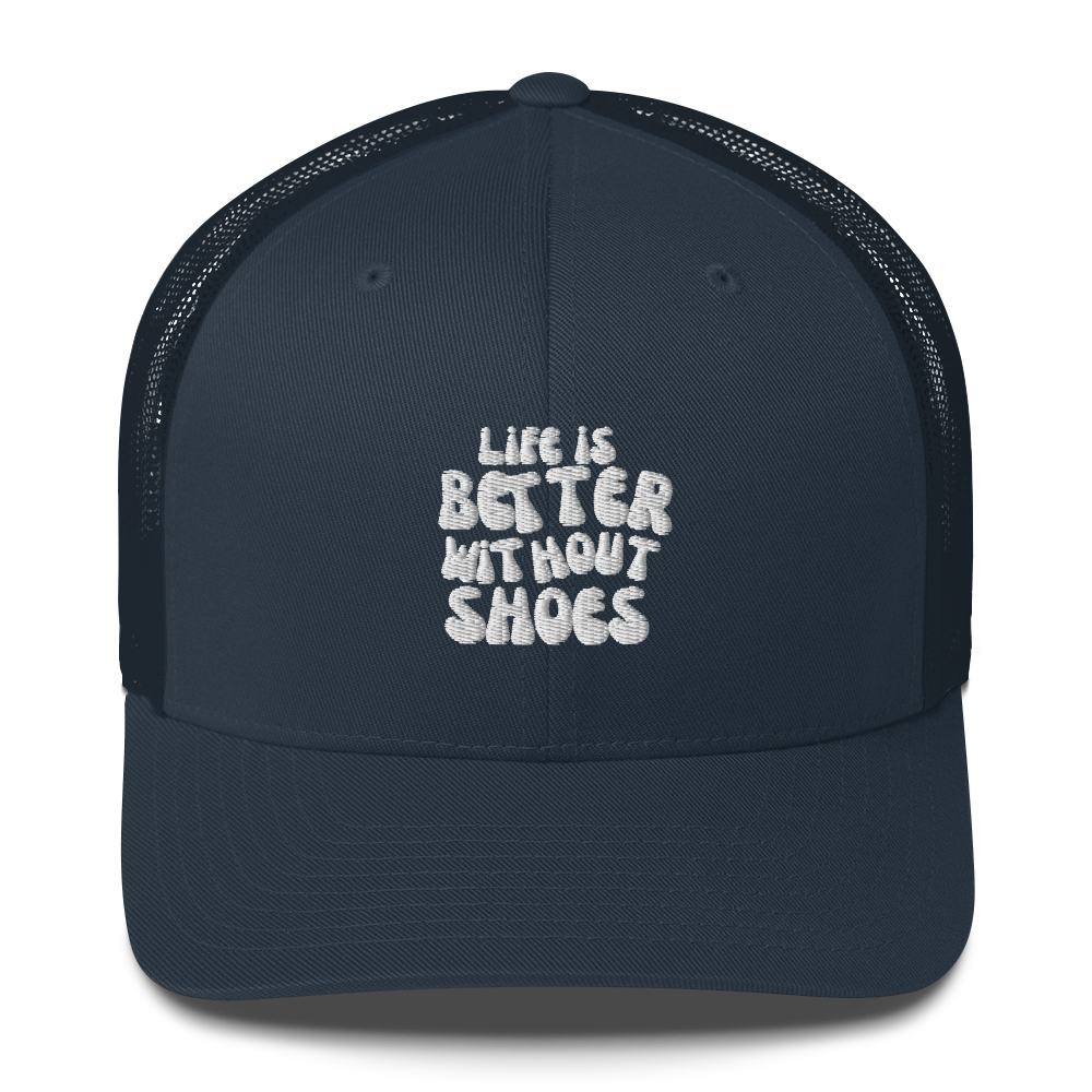 Navy blue cap with 'Life is Better Without Shoes' text on a white background