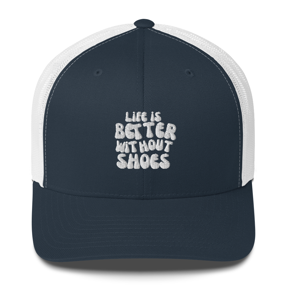 Navy blue and white cap with 'Life is Better Without Shoes' text on a white background